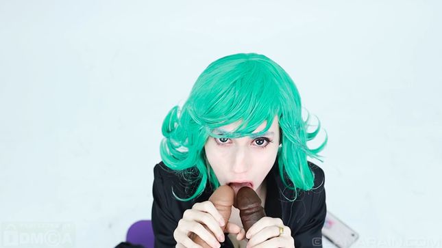 Green-haired beauty is playing with a dildo